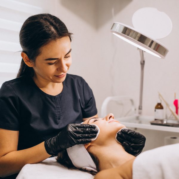 Dermatologist consulting a client in this image